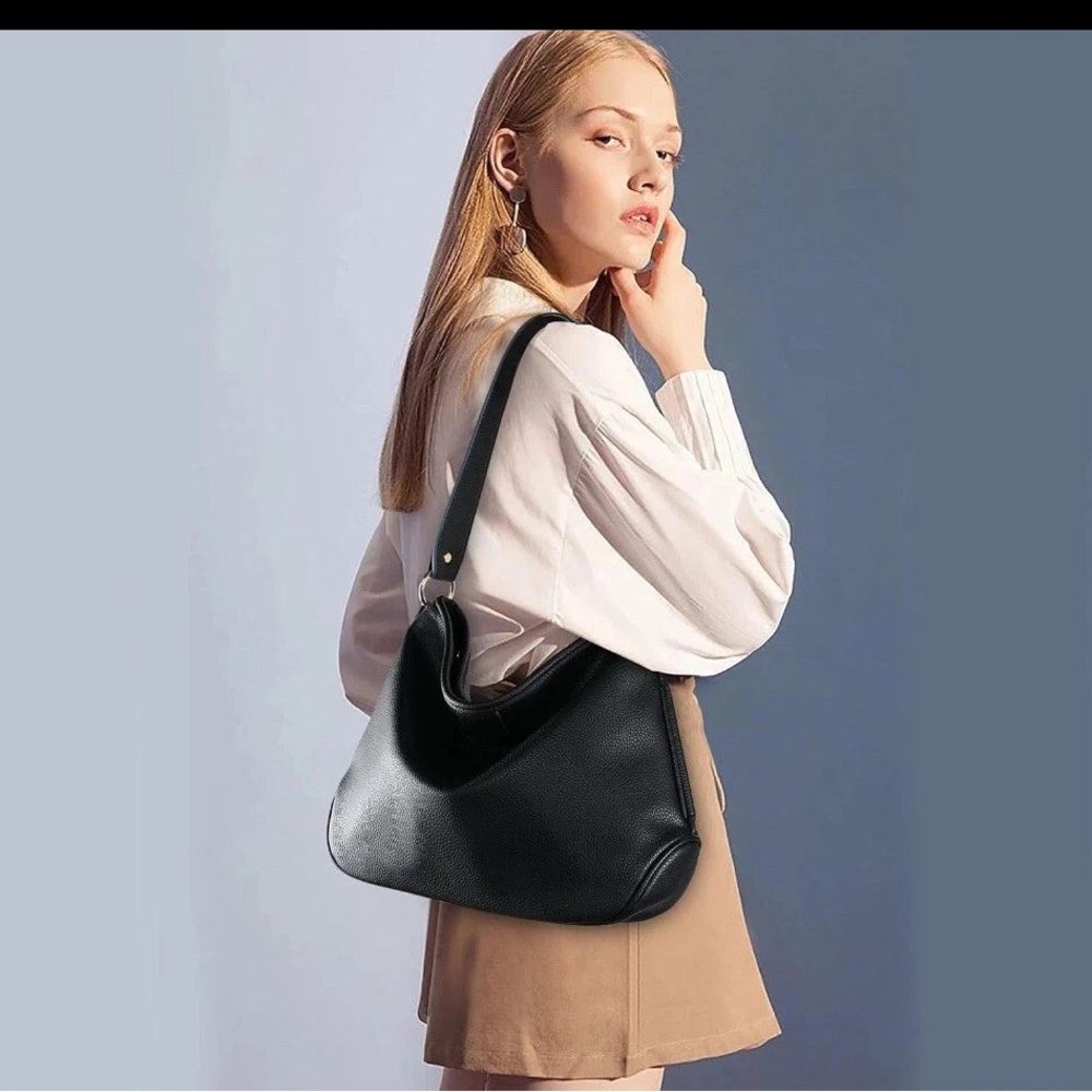 The Montana West black shoulder bag is a medium-sized pebble finish